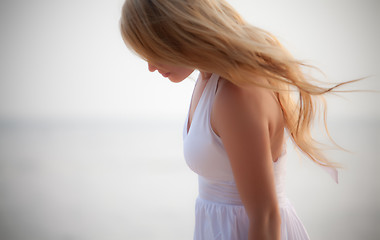 Image showing beautiful girl on seashore