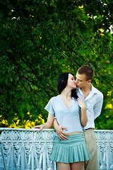 Image showing kissing couple in the park