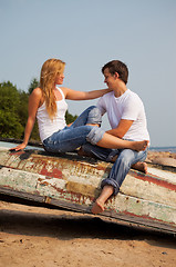 Image showing young couple on old boat