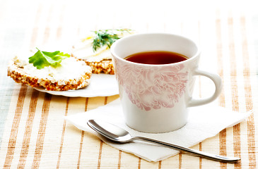 Image showing diet breakfast with tea and corn bread