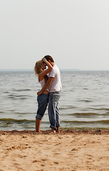 Image showing couple embrace on a beach