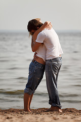 Image showing couple embrace on a beach