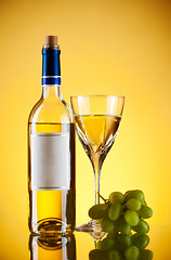 Image showing bottle and glass of wine, grape bunch