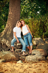 Image showing smiling couple next tree