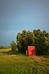 Image showing wooden cabin on meadow