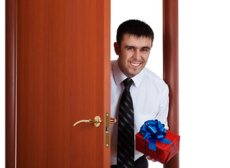 Image showing smiling man with gift