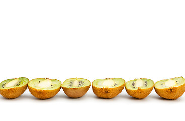 Image showing kiwi halves laying in row