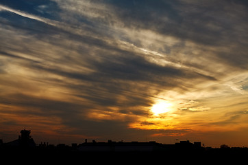 Image showing sunset above town