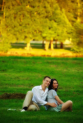 Image showing couple sitting on park lawn