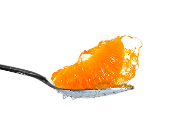 Image showing mandarin in jelly on spoon