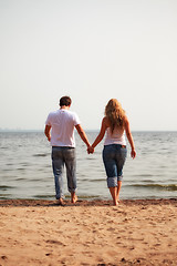 Image showing couple walking on a beach