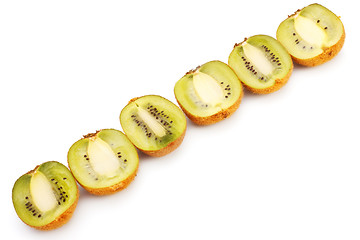 Image showing kiwi halves laying in row