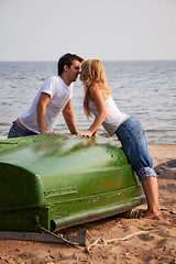 Image showing beautiful couple kissing on a beach