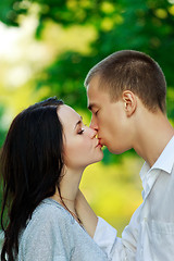 Image showing kissing couple in the park