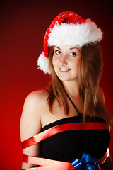 Image showing smiling girl in santa hat