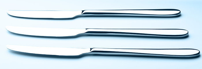 Image showing three table knives