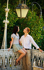 Image showing couple in a park under old streetlamp