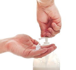 Image showing washing hands with liquid soap