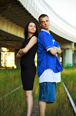 Image showing couple on rails