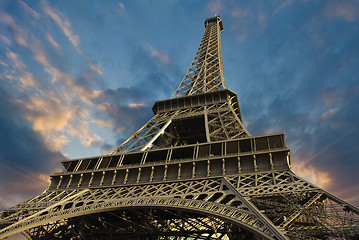 Image showing Eiffel Tower at Sunset against a Cloudy Sky