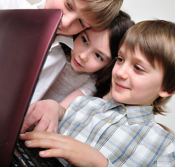 Image showing group of children friends playing computer games