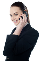 Image showing Female executive talking on mobile