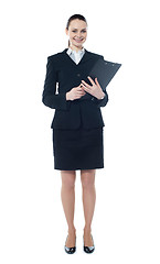 Image showing Young businesswoman with a document folder