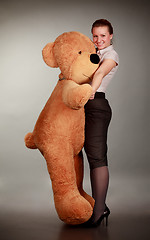 Image showing girl dancing with toy bear