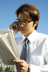 Image showing Reading businessman