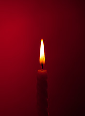 Image showing Candle On Red