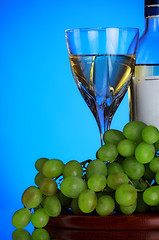 Image showing glass of wine and grape bunch