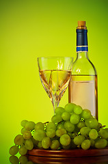 Image showing bottle and glass of wine, grape bunch