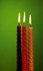 Image showing Three Candles On Green