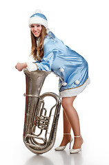 Image showing santa girl with big trumpet