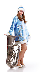 Image showing santa girl with big trumpet