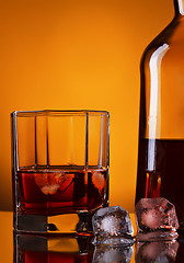 Image showing Whiskey Bottle And Glass