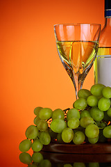 Image showing glass of wine and grape bunch