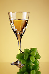 Image showing glass of wine and grape bunch
