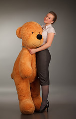 Image showing girl with funny toy bear