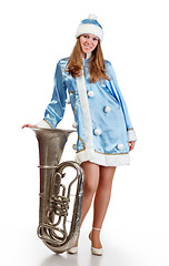 Image showing  santa girl with big trumpet