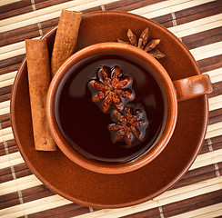 Image showing tea with cinnamon sticks and star anise