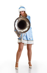 Image showing funny santa girl with big trumpet