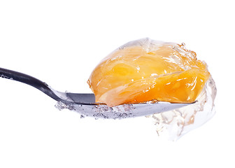 Image showing mandarin in jelly on spoon