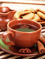 Image showing tea with cinnamon sticks and star anise