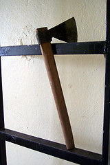 Image showing axe on ladder