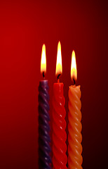 Image showing Three Candles On Red