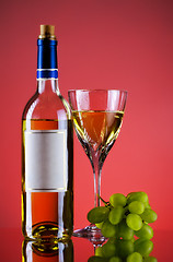 Image showing bottle and glass of wine, grape bunch