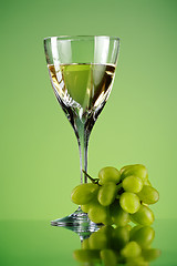 Image showing glass of wine and grape bunch