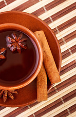 Image showing tea with cinnamon sticks and star anise