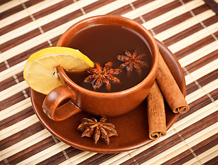 Image showing tea with cinnamon sticks and star anise